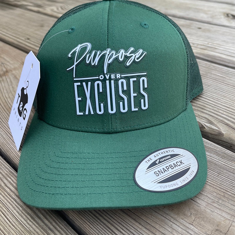 PURPOSE OVER EXCUSES TRUCKER HAT EVERGREEN