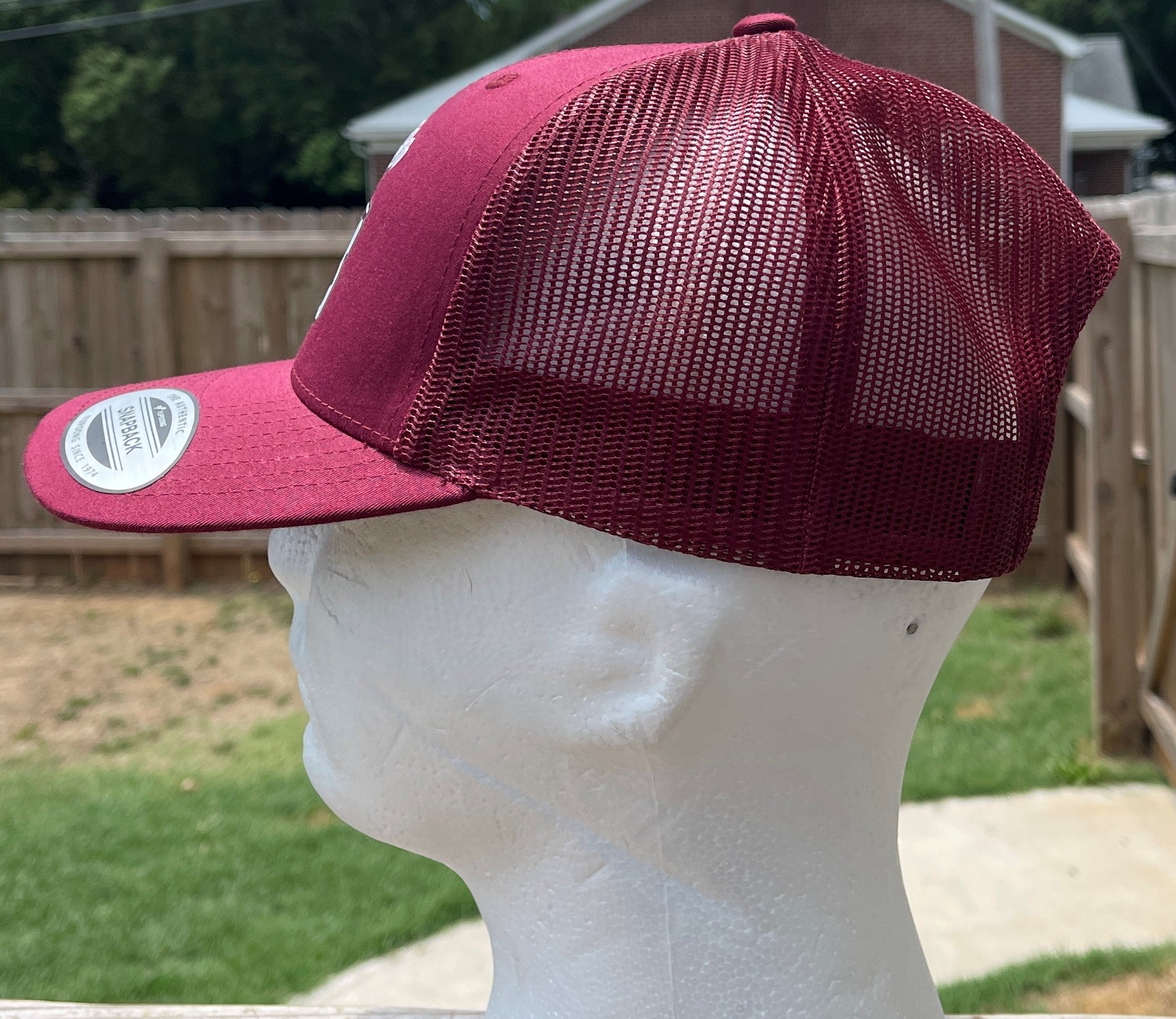 PURPOSE OVER EXCUSES TRUCKER HAT CRANBERRY
