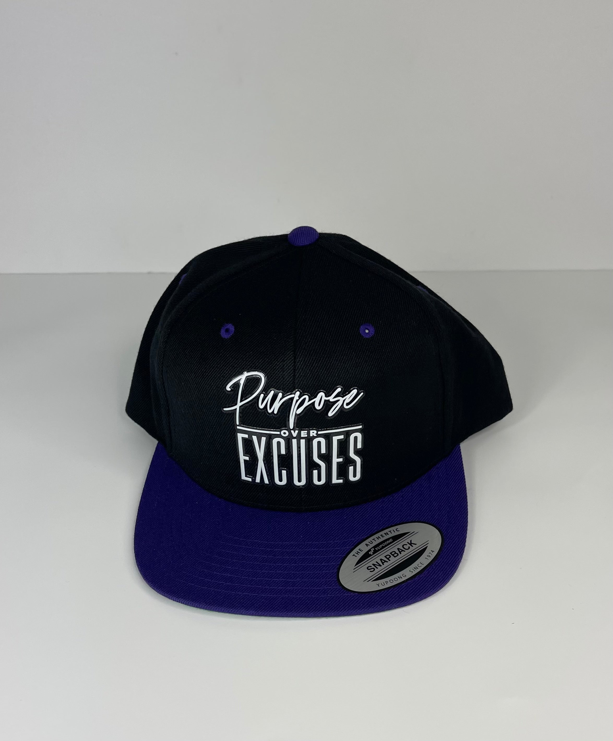 PURPOSE OVER EXCUSES SNAPBACK BLACK/PURPLE