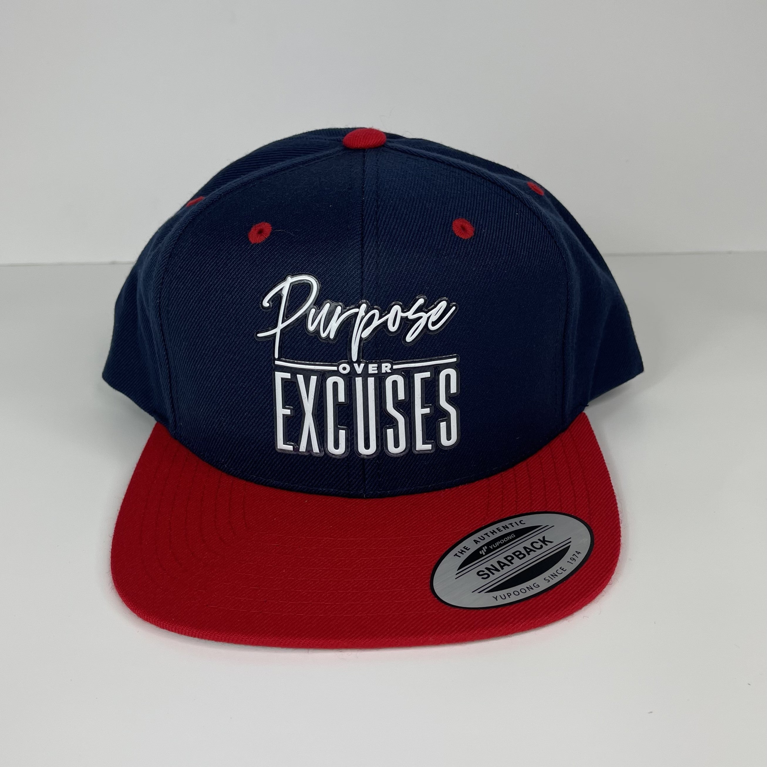 PURPOSE OVER EXCUSES SNAPBACK RED/NAVY BLUE