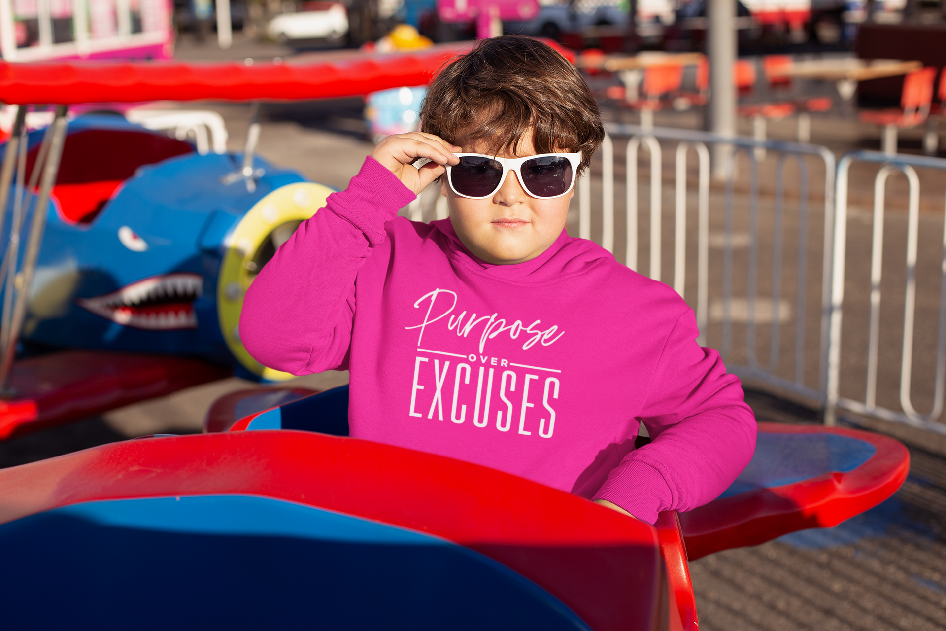 PURPOSE OVER EXCUSES YOUTH SWEATSHIRT SAFETY PINK