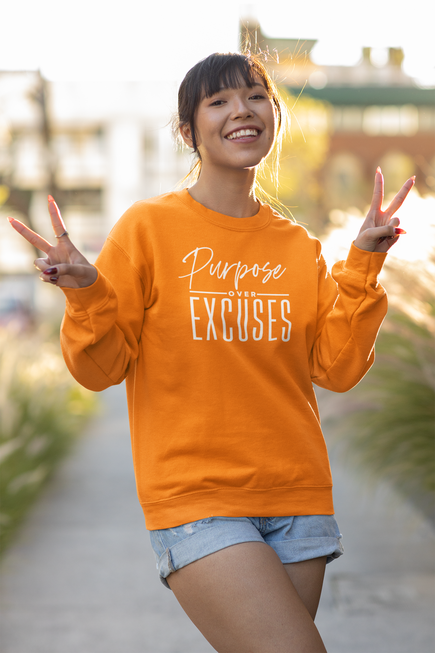 PURPOSE OVER EXCUSES ADULT SWEATSHIRT SAFETY ORANGE