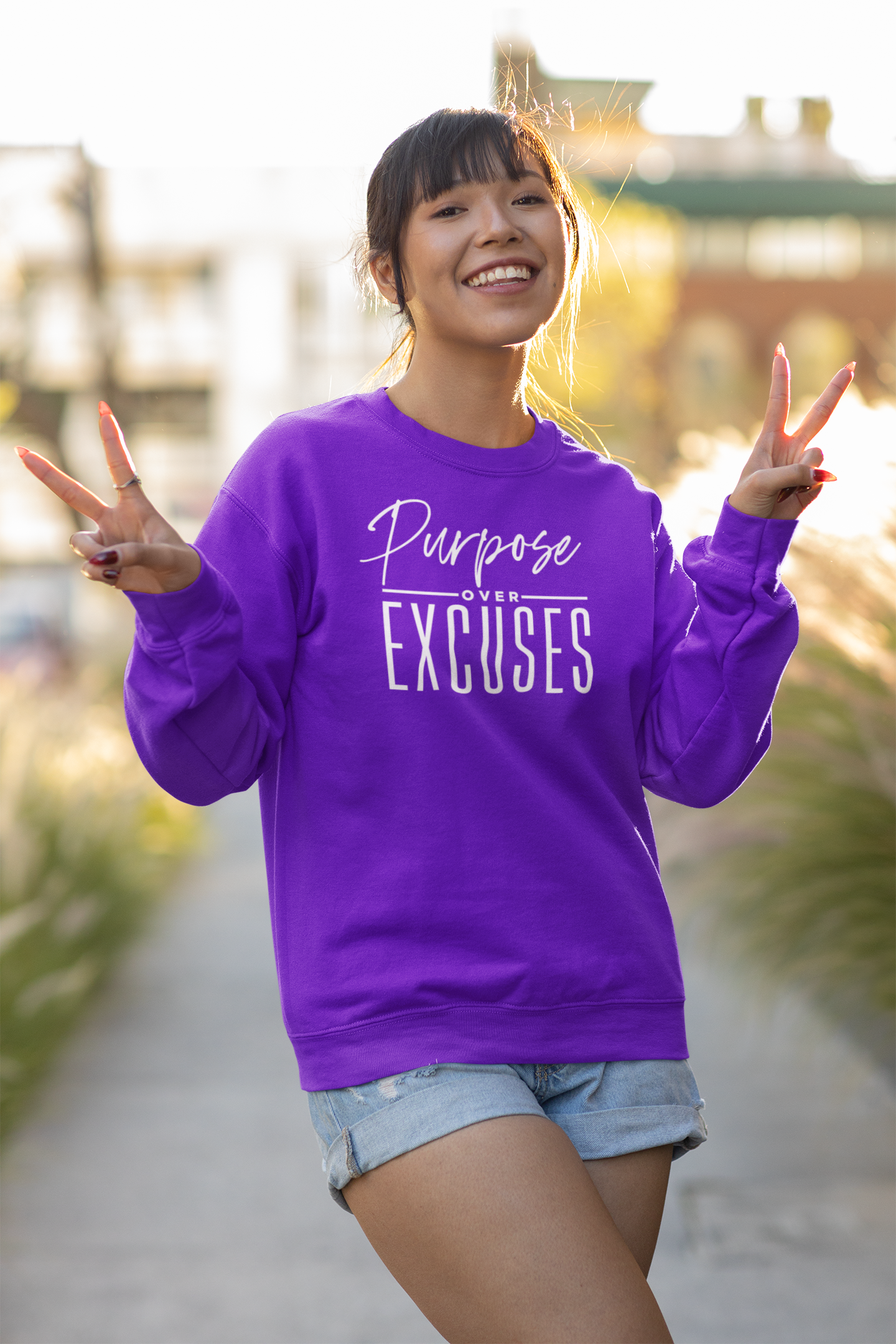 PURPOSE OVER EXCUSES ADULT SWEATSHIRT PURPLE